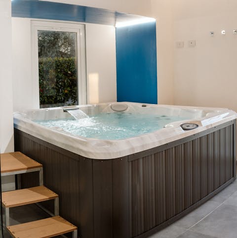 Unwind in the hot tub after a day of exploring