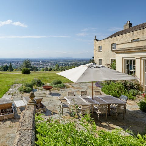 Spend summer evenings on the sun-kissed terraces with far-reaching views