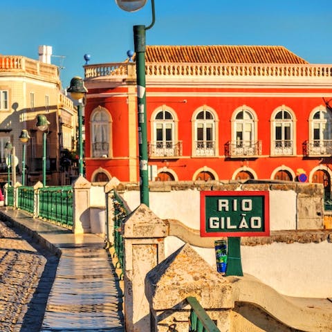 Make sunset strolls over the Rio Gilao part of your new routine