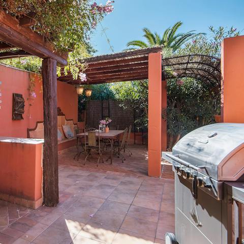 Fire up the barbecue and have alfresco meals in the shade of the pergola