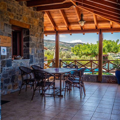 Dine with your loved ones on the covered terrace after a busy day spent exploring
