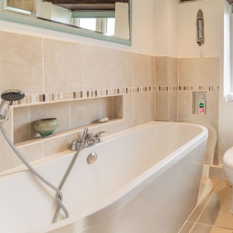 Slip into the bathtub for a long, luxurious soak