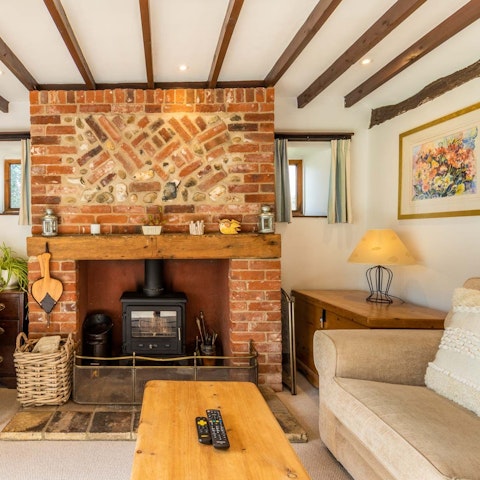 Curl up next to the wood-burning stove on chilly evenings