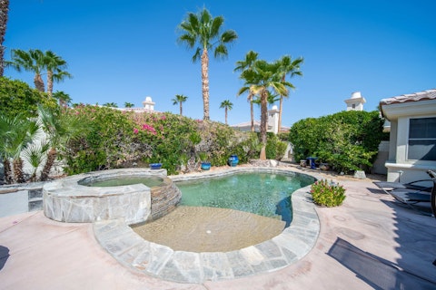 Cool off in the private pool surrounded by desert palms