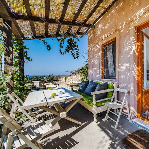 Get a break from the Green sunshine on the covered patio
