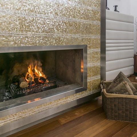 Get the fire going in the lounge if the temperature dips in the evening