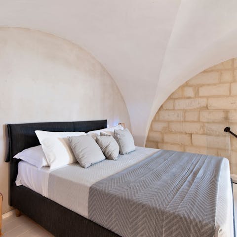 Sink into the cosy bed after a long day of sightseeing