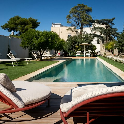 Laze by the private pool in the garden