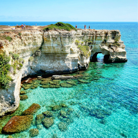 Discover Faraglioni di Sant'Andrea, a twenty-minute drive away