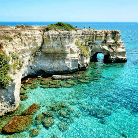 Discover Faraglioni di Sant'Andrea, a twenty-minute drive away