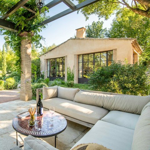Find a comfy spot in the garden to share a bottle of wine