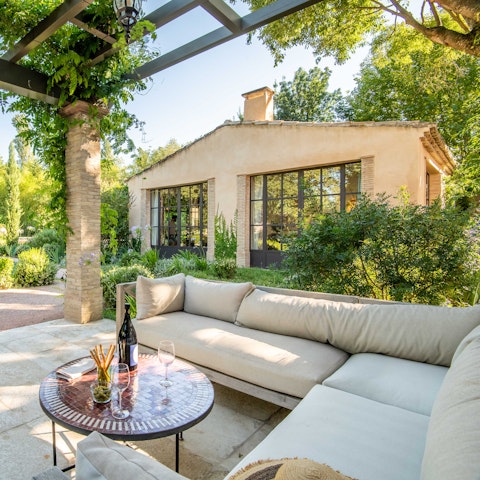 Find a comfy spot in the garden to share a bottle of wine