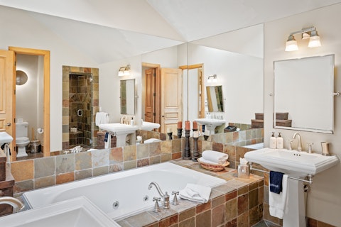 Unwind in the spa-like bathroom after a day on the mountain