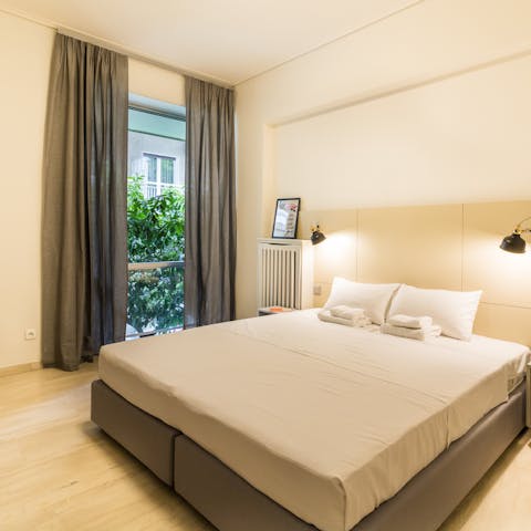 Wake up to green scenes through the Juliet balcony doors in the king-sized bedroom