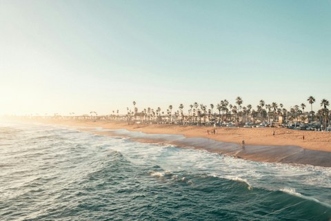 Sink your toes into the sand of Balboa Beach, a short stroll away