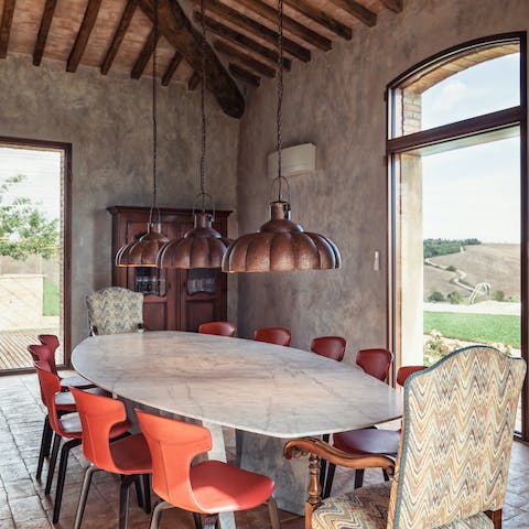 Savour local wine and delicious Italian meals around the dining table