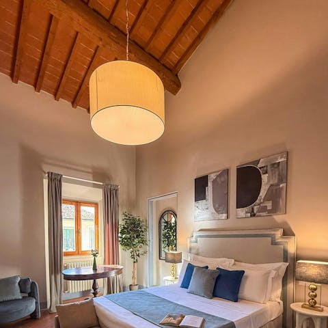 Admire the period features of the elegant bedroom