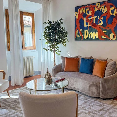 Get together for aperitifs in the light-filled living room
