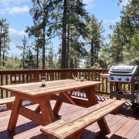Dine on the back porch, amidst the pine trees