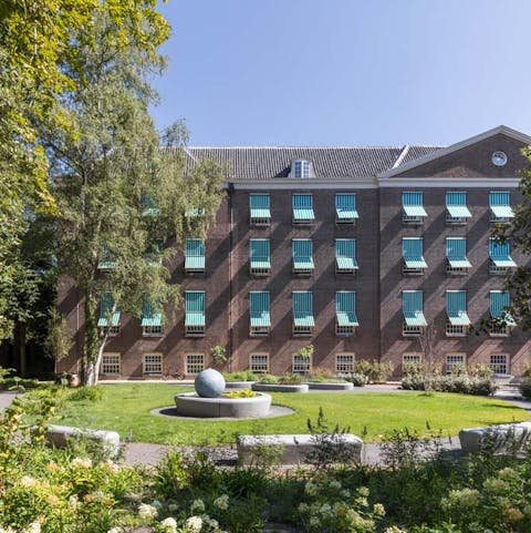 Take a book out to the building's grounds and lie back on the grass