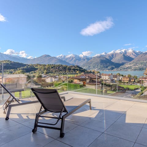 Stretch out on the sun loungers and admire the lake views
