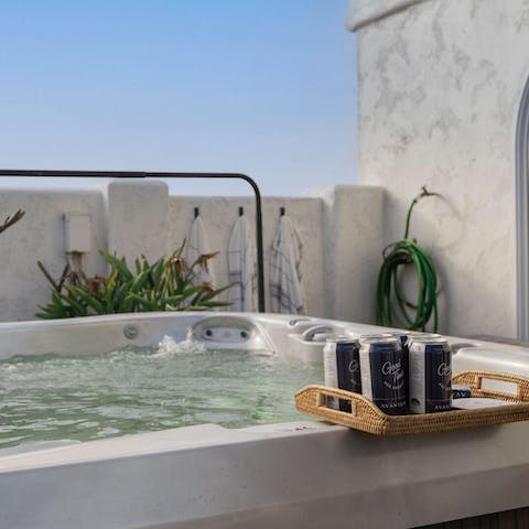Soak in the hot tub with a cold beer