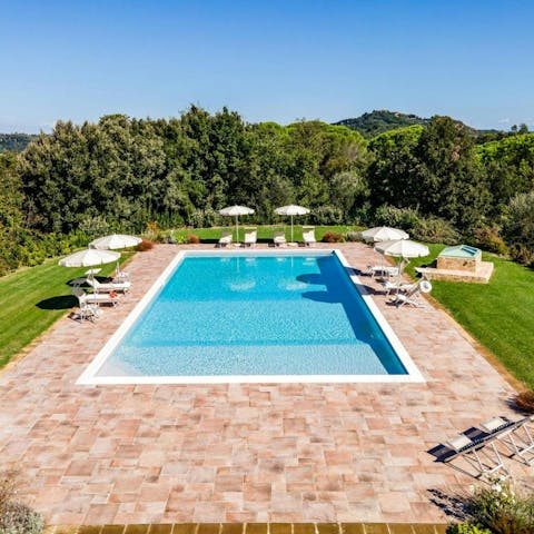 Experience total relaxation while lounging by the pool