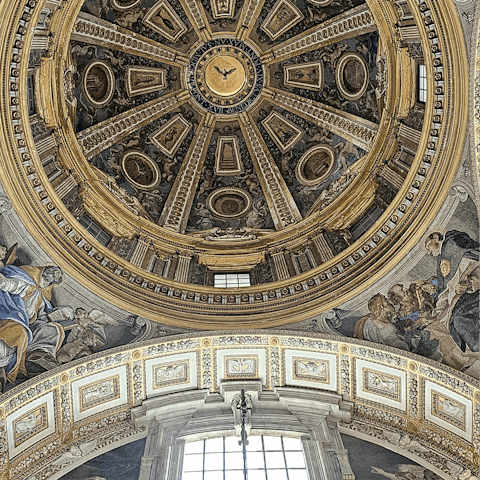 Gaze up in awe at St. Peter’s Basilica – Vatican City is just across the road