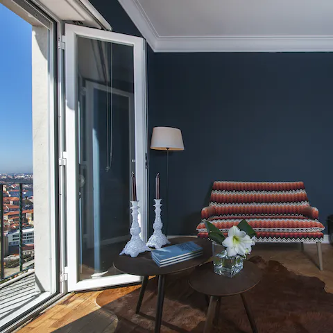 Fling the door open and watch the hustle and bustle of the city below