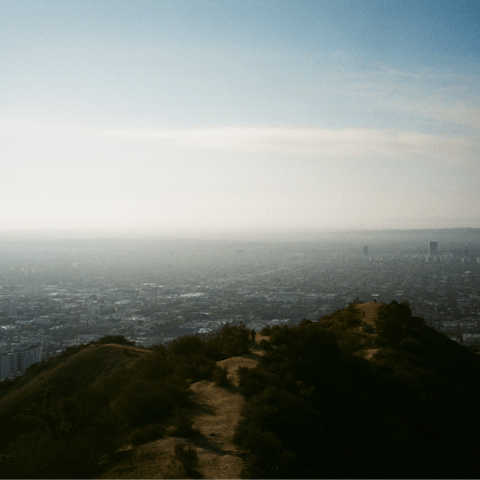 Hike around Runyon Canyon Park and enjoy views across LA