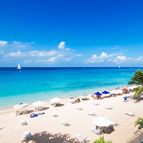 Step out onto Payne's Bay Beach, right in front of your apartment