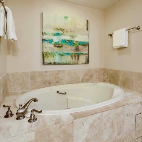 Bubble away in the jacuzzi bathtub after a day of shopping in La Jolla