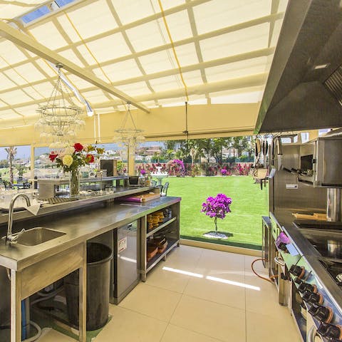 Make use of the outdoor chef's kitchen