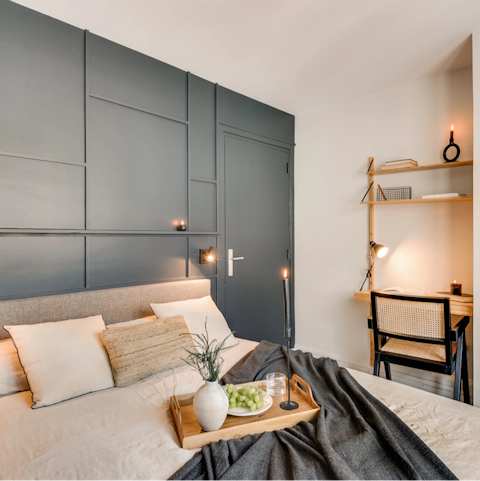 Catch up on work while away in Paris at the desk in the bedroom