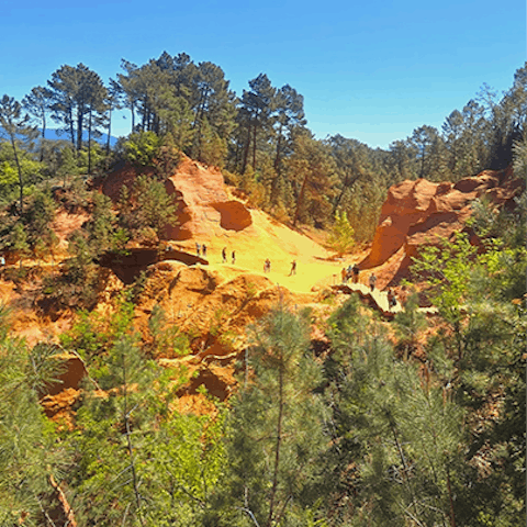 Take the scenic trail through the Sentier des Ocres, a must-visit in Roussillon