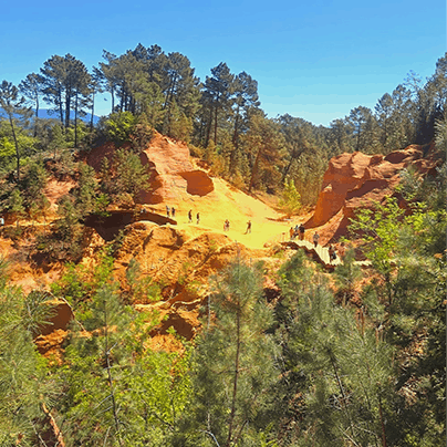 Take the scenic trail through the Sentier des Ocres, a must-visit in Roussillon