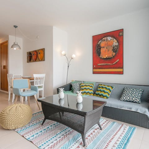 Enjoy a warm welcome from the bright living room