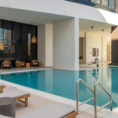 Relax in the shared rooftop pool