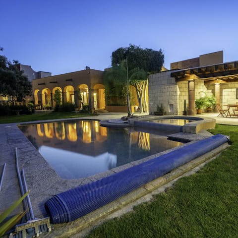 Swim under the stars in the on-site shared pool