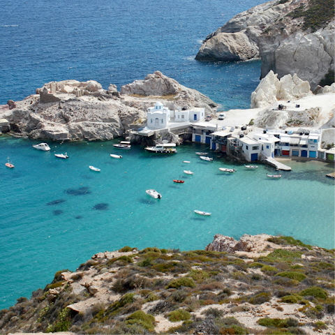 Explore the capes and coves dotted around Milos