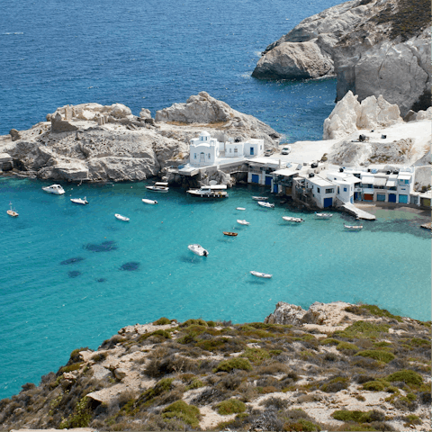 Explore the capes and coves dotted around Milos
