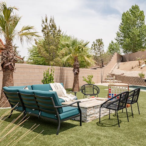 Play lawn games or relax on the sofas with a glass of wine