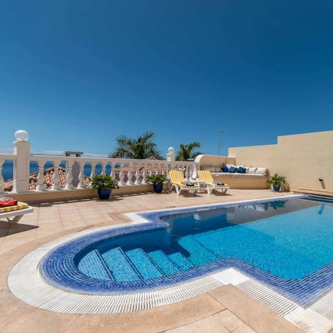Savour stunning sea views from the poolside
