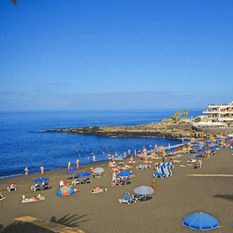 Enjoy a beach day at Playa de la Arena – a short walk away