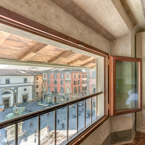 Enjoy the view of the historic square from the bedroom