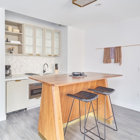 Enjoy coffee and a chat at the stylish breakfast bar