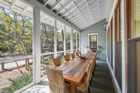 Enjoy an alfresco meal on the screened porch