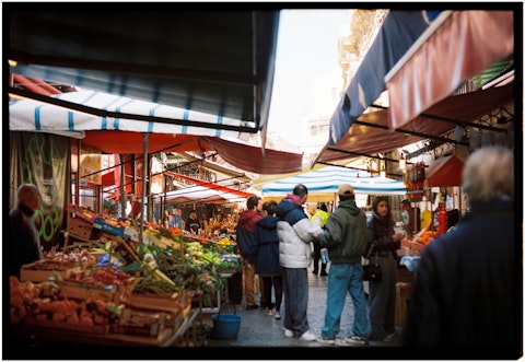Immerse yourself in Ballarò Market's vivid colours, aromas, and street food, about thirty-minutes by car