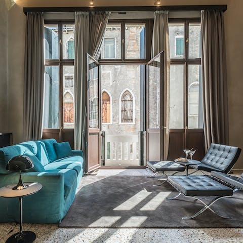 Open up the patio doors to enjoy the beautiful architecture outside