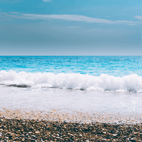Walk down to the rocky hidden beach of Paralia Fieroulas